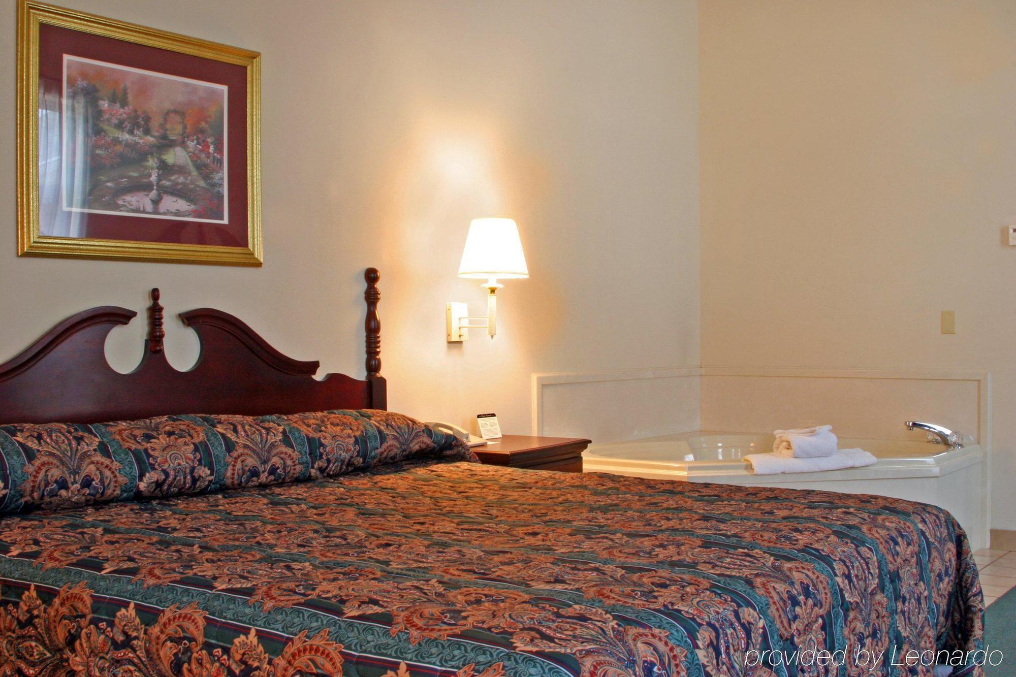 Collins Inn & Suites Habitación foto