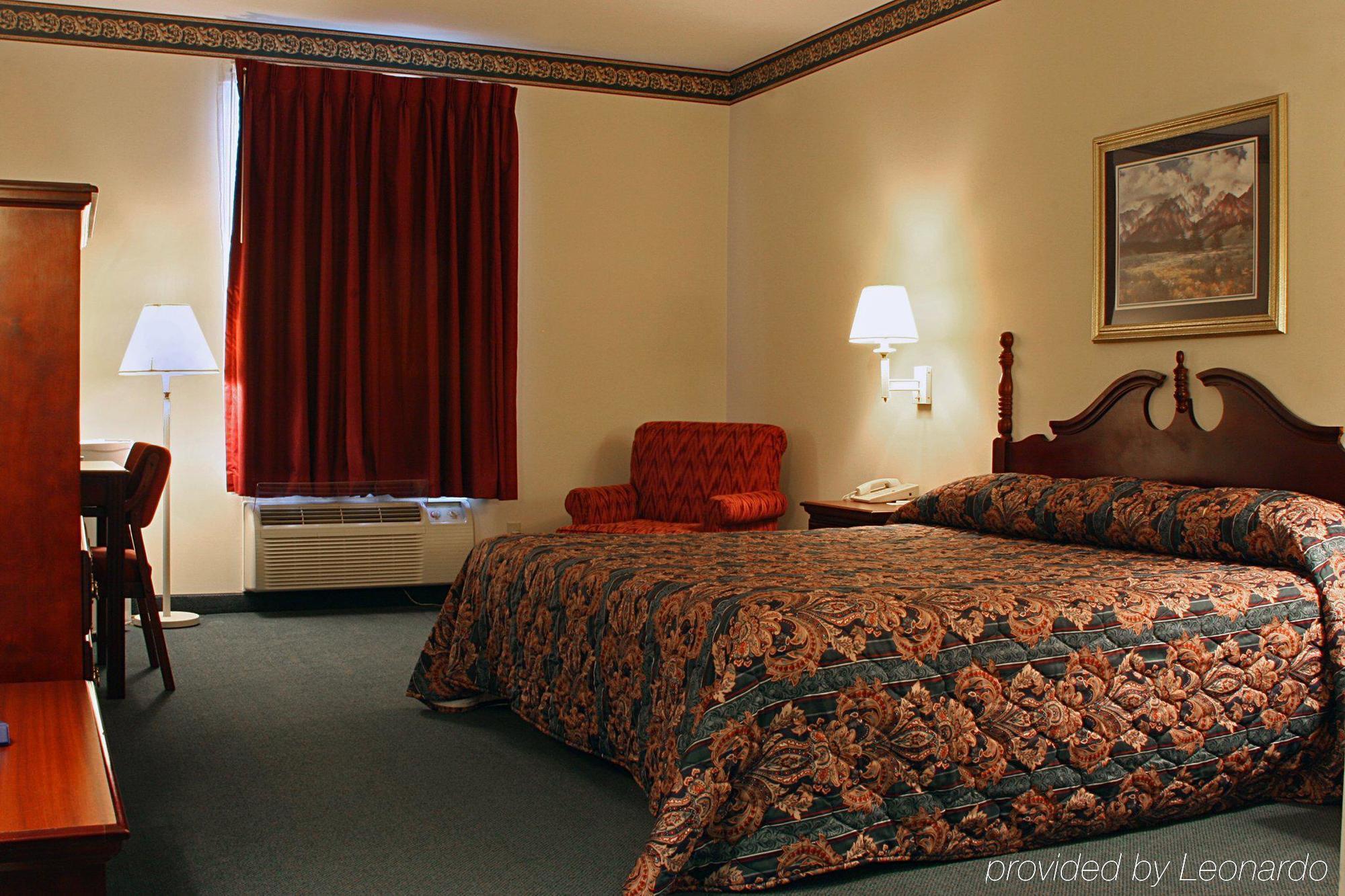 Collins Inn & Suites Habitación foto